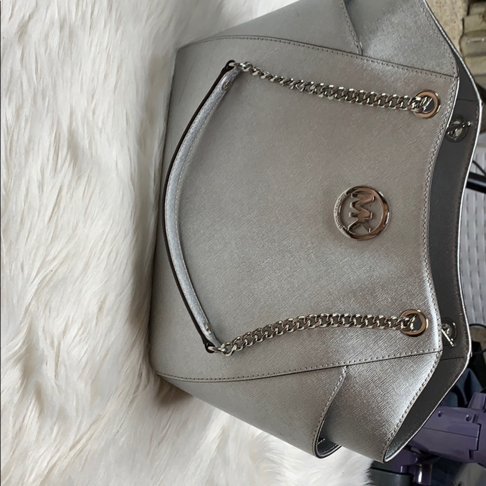 Silver Metallic Micheal Kors used very lightly